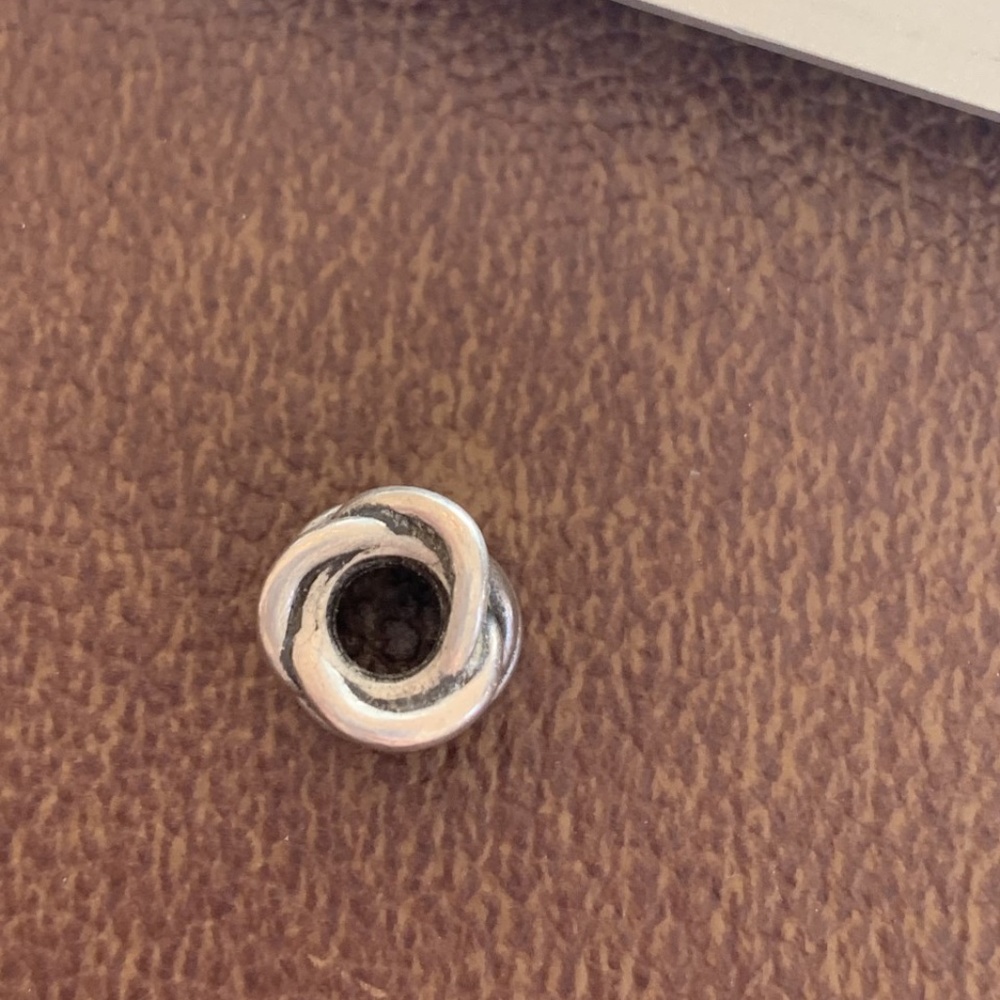 Pandora Twisted Forget me knot Charm #790484